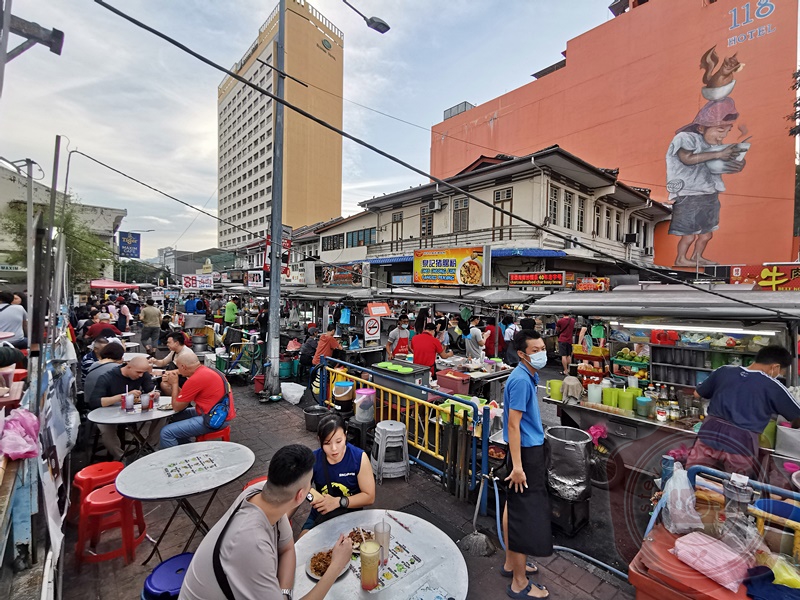 Street-level view of New Lane hawker stalls at night